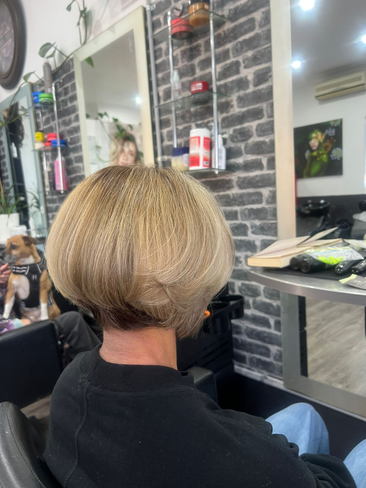 Classic stacked blonde bob cut from the back